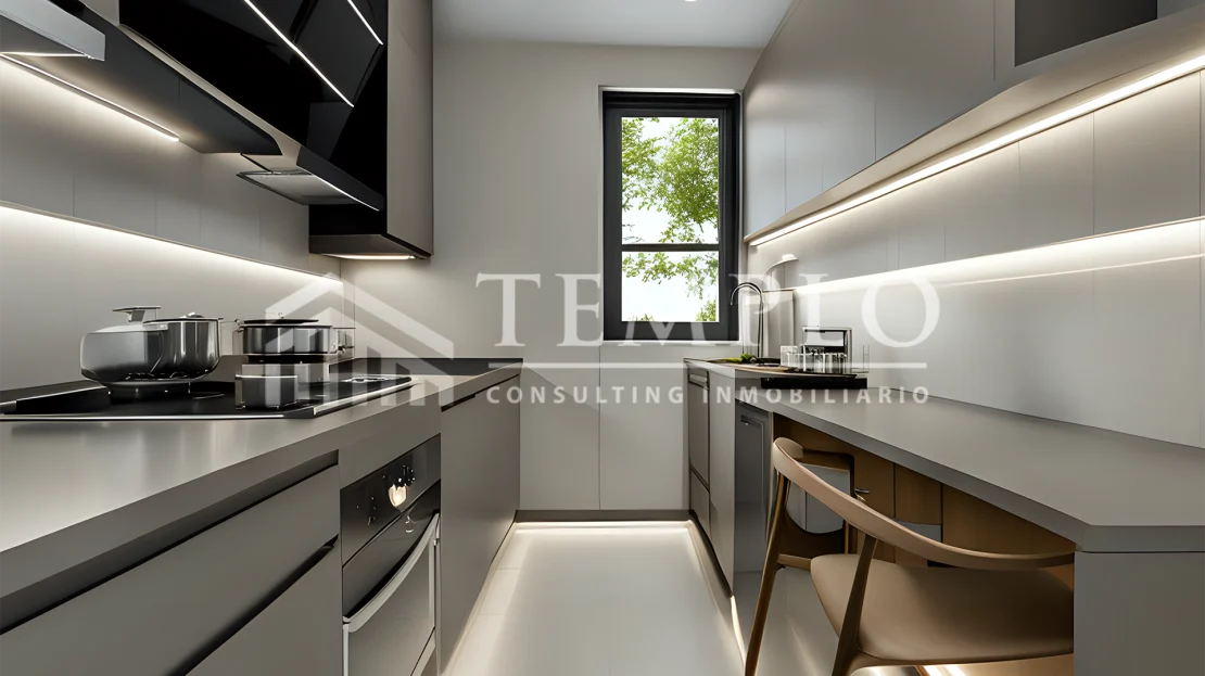 Cocina moderna y luminosa reformada por Virtual Home Staging en un piso en venta.